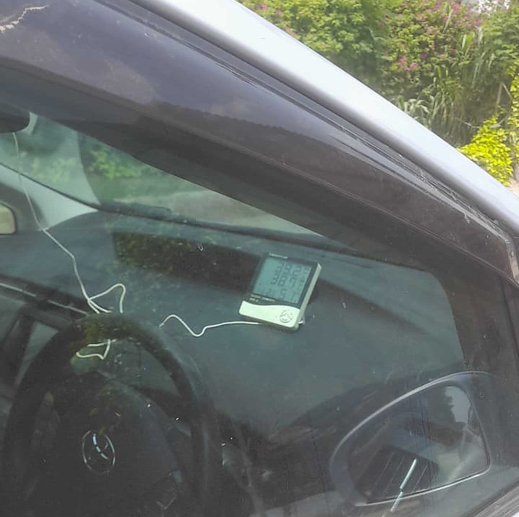 After UV tint — same Prius, Q Tints film installed, meter dropped to 38°C